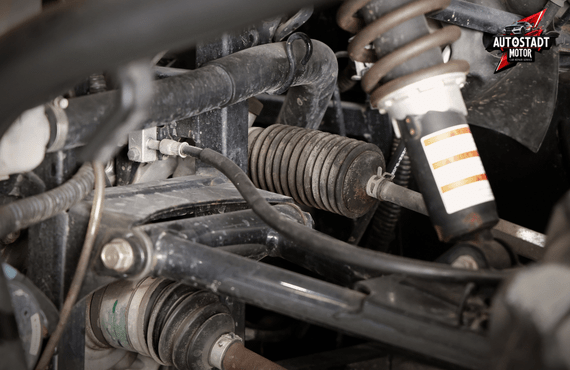 Frequently Asked Questions About Suspension and Steering Repair Dubai 1. How often should I have my suspension and steering system inspected in Dubai? Due to Dubai’s unique driving conditions, it is recommended to inspect your suspension and steering system every 20,000 to 30,000 kilometers. The extreme heat, frequent highway driving, and constant exposure to speed bumps can accelerate wear and tear on components such as shock absorbers, struts, control arms, and steering racks. Regular inspections help identify minor issues early, preventing them from escalating into costly repairs and ensuring your vehicle remains safe and comfortable on all types of roads, whether you are driving a Toyota Land Cruiser, Nissan Patrol, or Mercedes-Benz. 2. How much does suspension and steering repair in Dubai usually cost? The cost of suspension and steering repair in Dubai depends on the vehicle type, severity of the problem, and the components that need replacement. Minor repairs such as replacing worn tie rods or bushings are relatively affordable, whereas major work like steering rack replacement or air suspension repair for vehicles like BMW or Tesla can be more expensive. At Auto Stadt Car Garage, we provide clear, upfront estimates and detailed repair plans, ensuring you understand exactly what is required and how much it will cost before we start any work. This approach eliminates hidden charges and allows you to make informed decisions. 3. Is it safe to continue driving with a faulty suspension or steering system? Driving with a worn suspension or steering system is highly unsafe. Faulty shock absorbers, damaged control arms, or malfunctioning steering components can reduce vehicle stability, increase braking distance, and affect overall handling. This becomes especially dangerous at high speeds on highways like Sheikh Zayed Road or when driving heavy vehicles such as the Nissan Patrol or Toyota Land Cruiser. Immediate professional inspection and repair are essential to prevent accidents, further damage to your vehicle, and costly repairs down the line. 4. Can wheel alignment alone fix steering issues? While wheel alignment can correct minor pulling or drifting, it cannot resolve problems caused by worn or damaged suspension and steering components. Components like ball joints, tie rods, or control arms must be repaired or replaced to restore proper steering performance. For example, luxury vehicles such as Mercedes-Benz or BMW often require precise alignment combined with component repair to maintain the manufacturer’s steering accuracy. At Auto Stadt Car Garage, we ensure both alignment and component integrity are addressed during suspension and steering repair Dubai to provide lasting results. 5. How long does a suspension and steering repair usually take? Suspension and steering repair Dubai